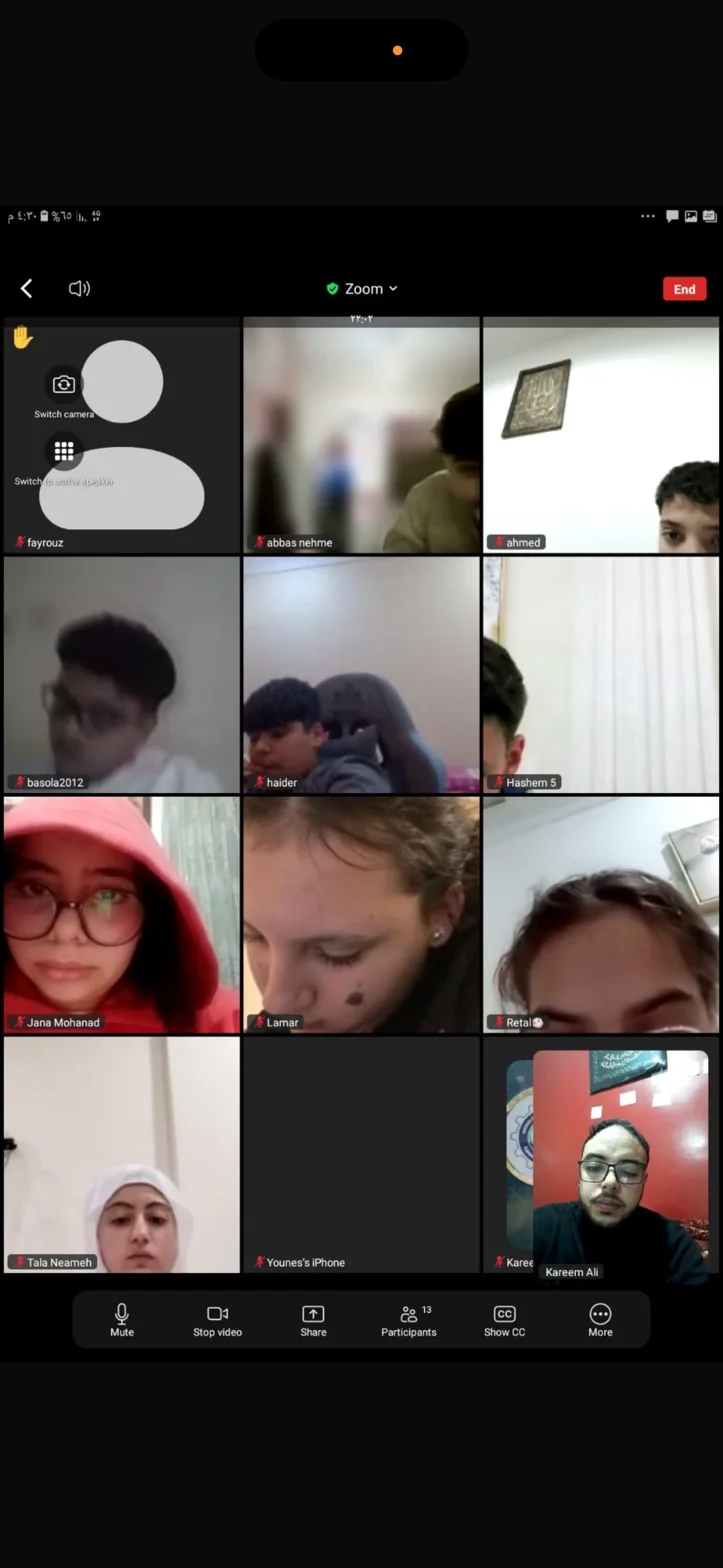 Students together in a live online class, their faces visible across the video call grid.